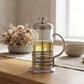 مصفاة قهوة French Press بجسم زجاجي وإطار معدني